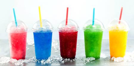 53902814-panoramic-still-life-of-colorful-frozen-fruit-slush-granita-drinks-in-plastic-take-away-cups-with-li